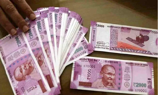 Rupee turns flat at 82.74 against US dollar