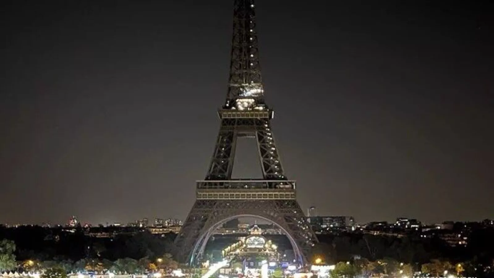 Eiffel Tower joins global mourning for Morocco's earthquake victims, dims in tribute to 2000 lives lost