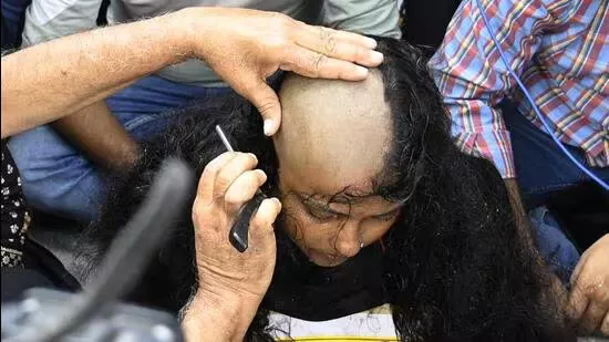 Woman shaves head in protest as job aspirants' agitation reaches 1,000th day in Kolkata