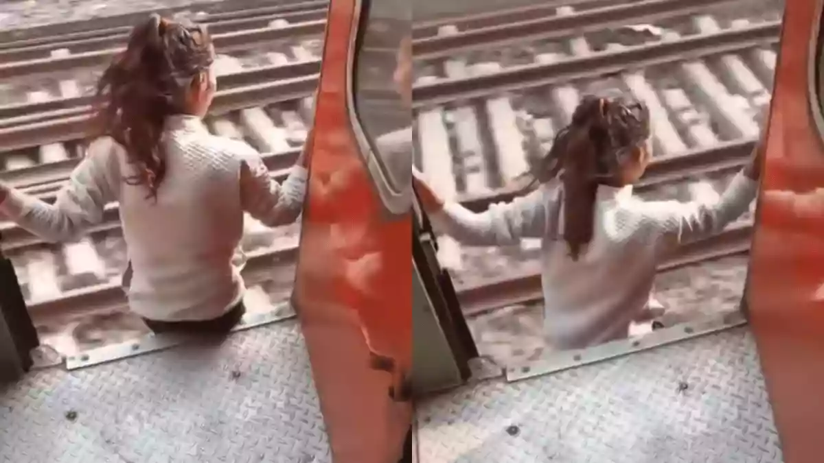 Shocking video: Girl jumps from moving train, man films instead of stopping