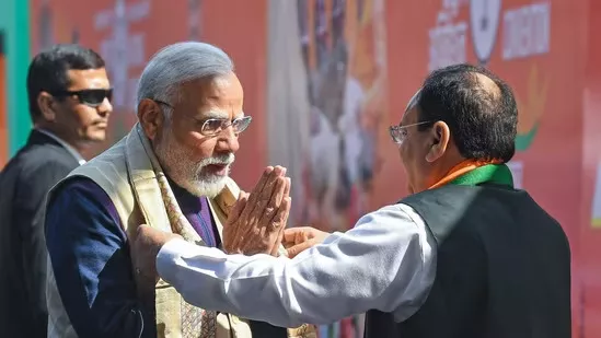 BJP aims for 370 seats, Modi hails lotus symbol for polls




