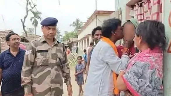 BJP MP kisses woman during election campaign in North Malda | Viral photo