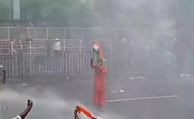 Elderly protestor braves water cannon; BJP says 