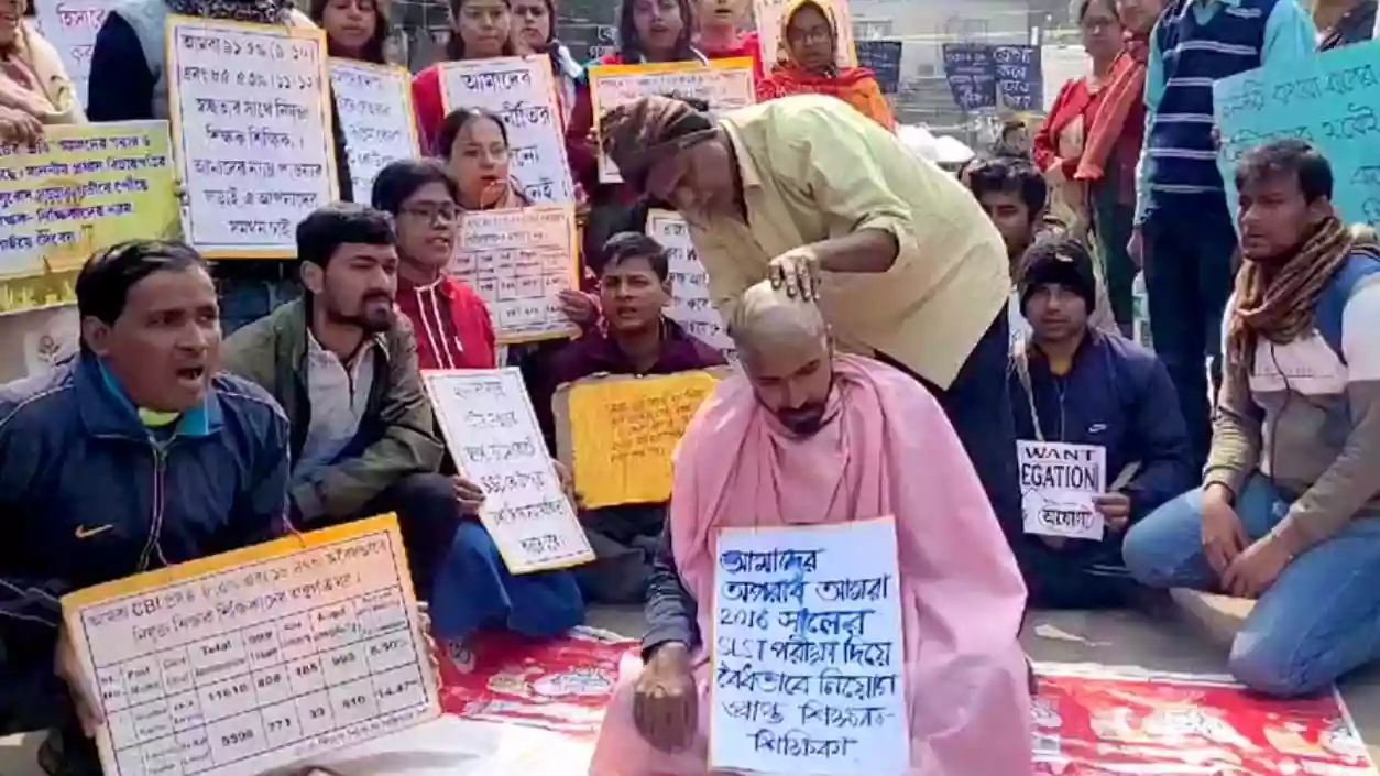 Protesting teacher goes bald outside Bikash Bhavan