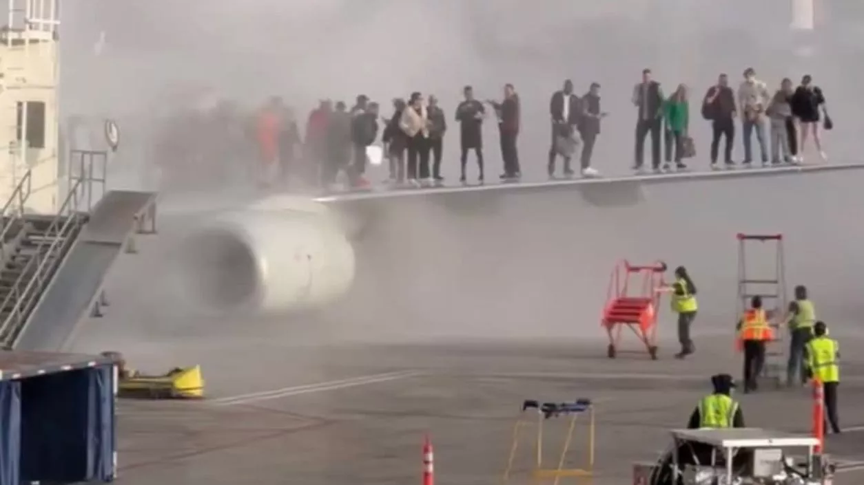 Plane catches fire at US' Denver airport, passengers climb on wings