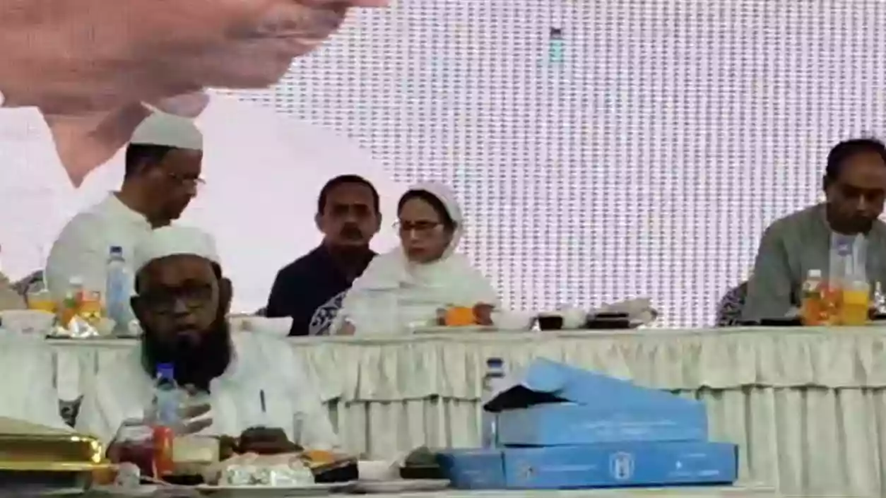 Mamata Banerjee receives Messi-signed jersey at Kolkata iftar