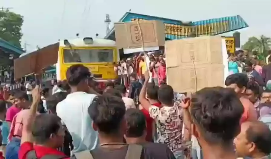 Male passengers block local train at South Barasat in protest against increased female coaches