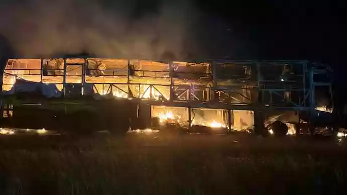Bus bursts into flames, killing 20 people after collision with bike in Andhra