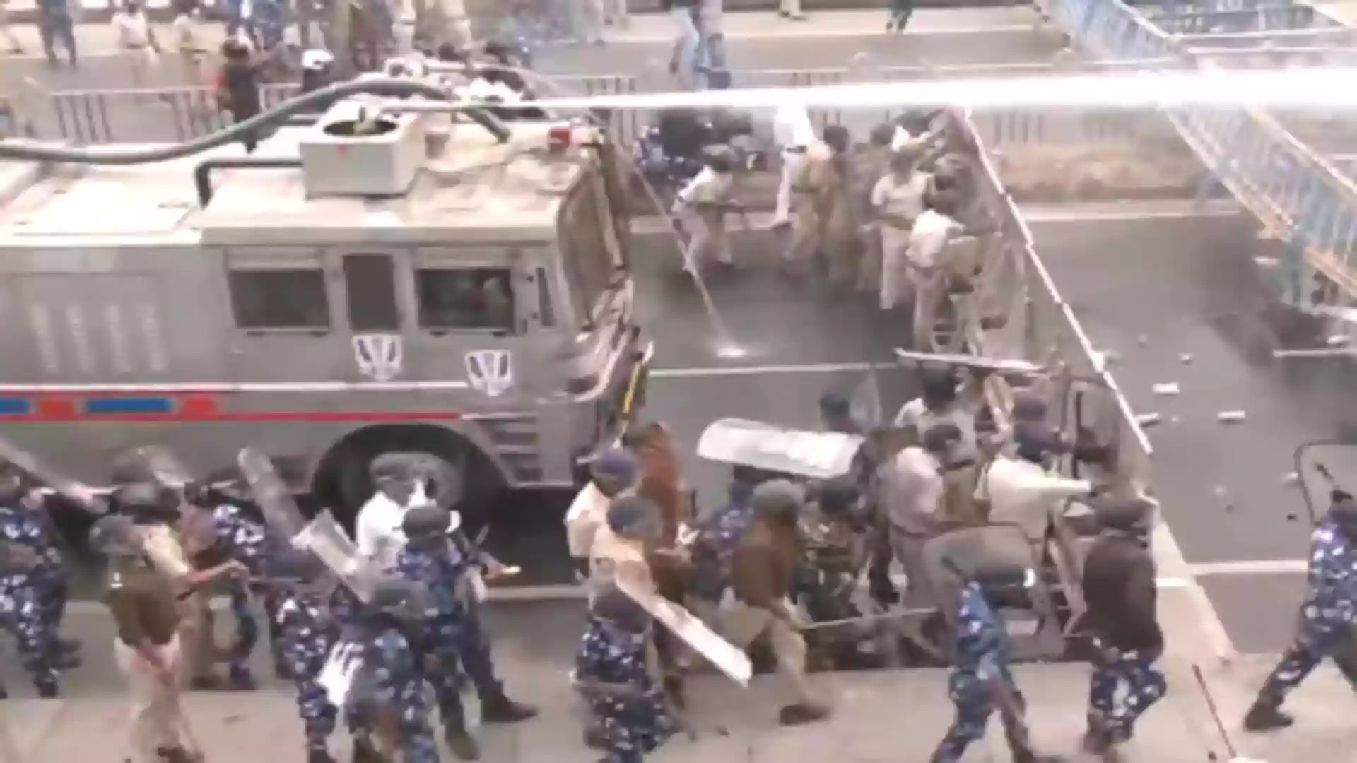 Tribals gherao secretariat building in Siliguri, police fire tear gas, water cannon | Watch