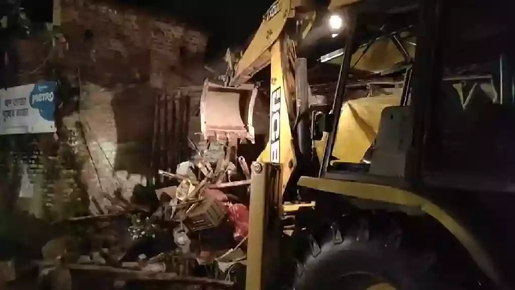 Late-night bulldozer action near Bandel station, illegal shops razed